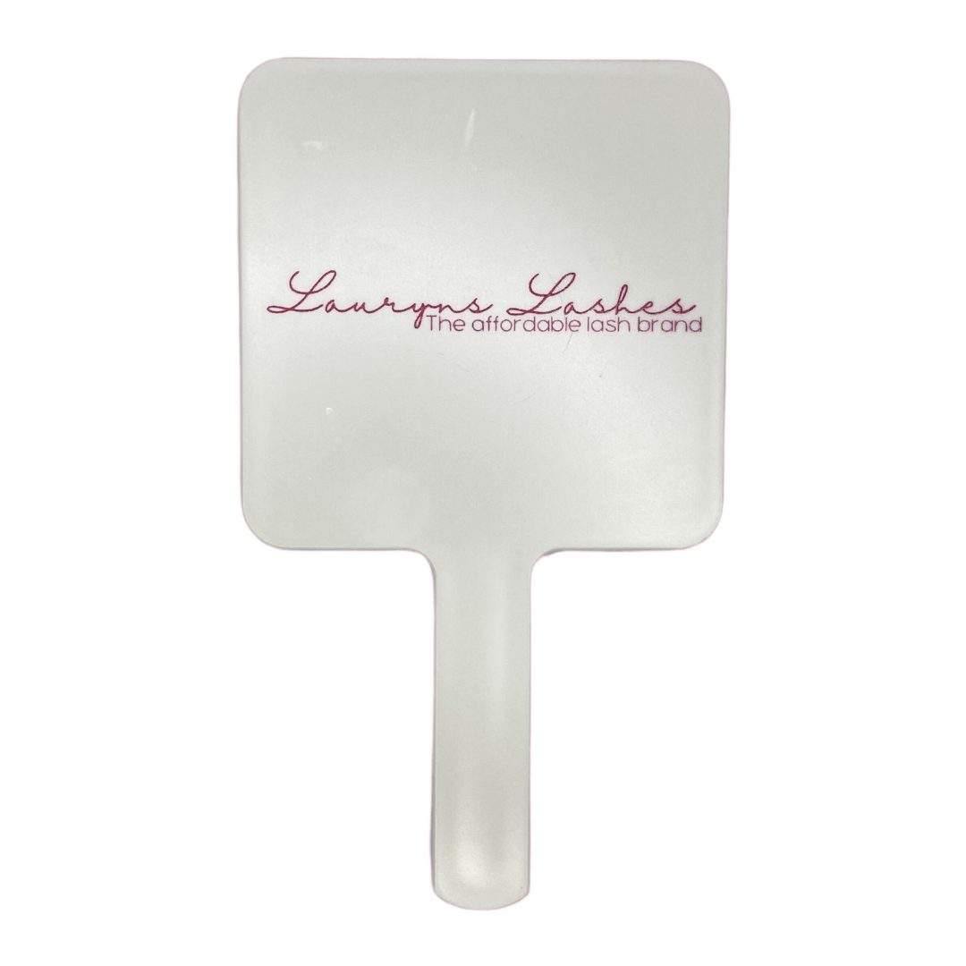 handheld white mirror with logo on the back