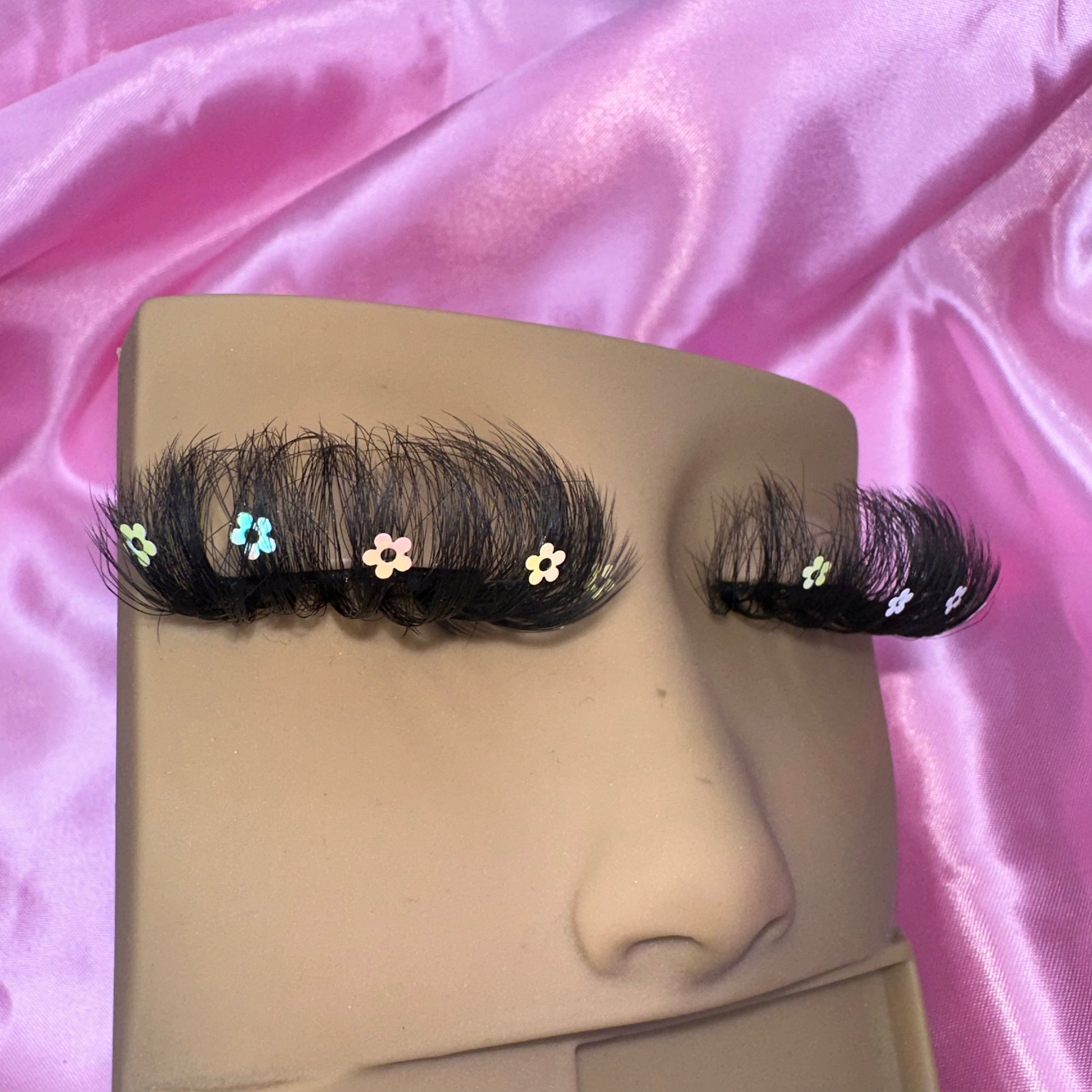 model displaying right side of 25mm strip lashes 
