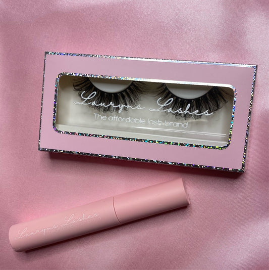 a pair of strip lashes and lash glue